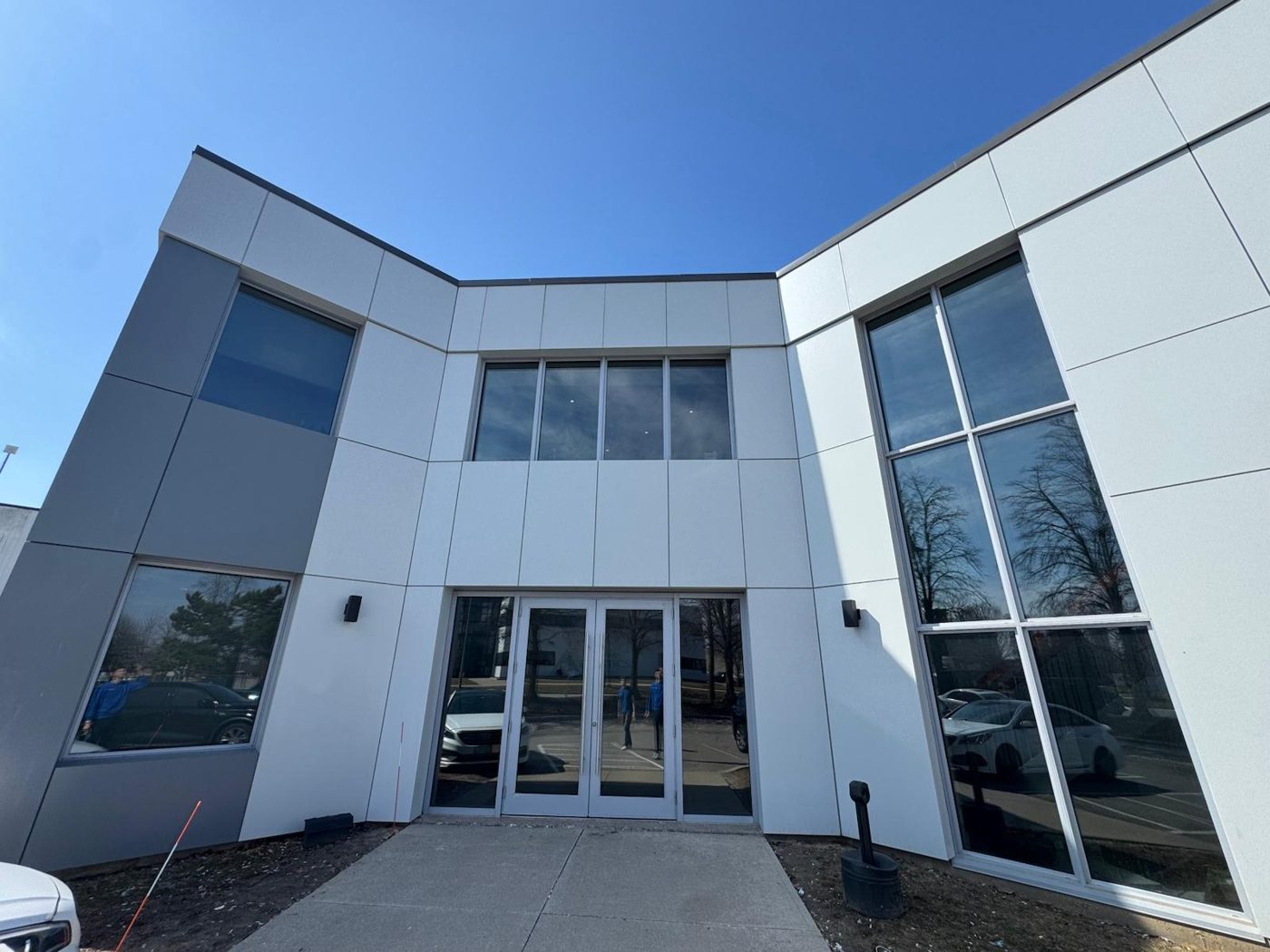 Commercial building entrance with film on the doors and windows
